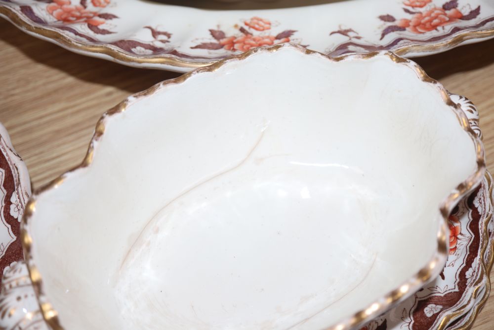 A Victorian Copeland part dinner service, transfer-printed with peonies and foliage in orange and brown,